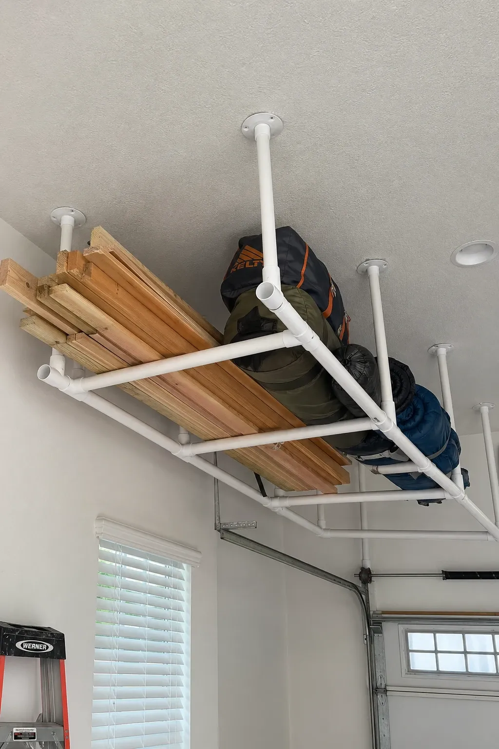 overhead pvc pipe storage rack in a garage