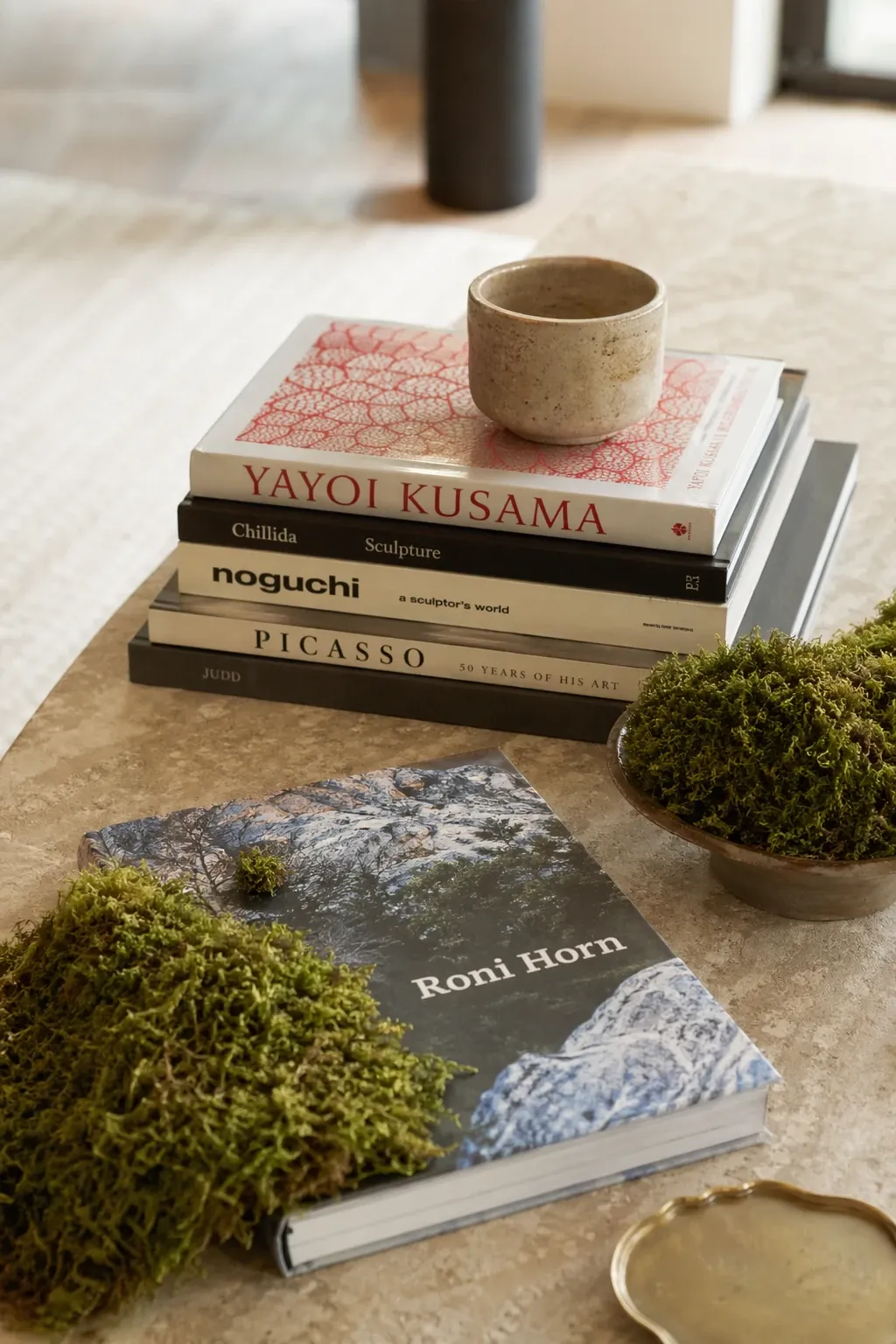 art books and natural moss