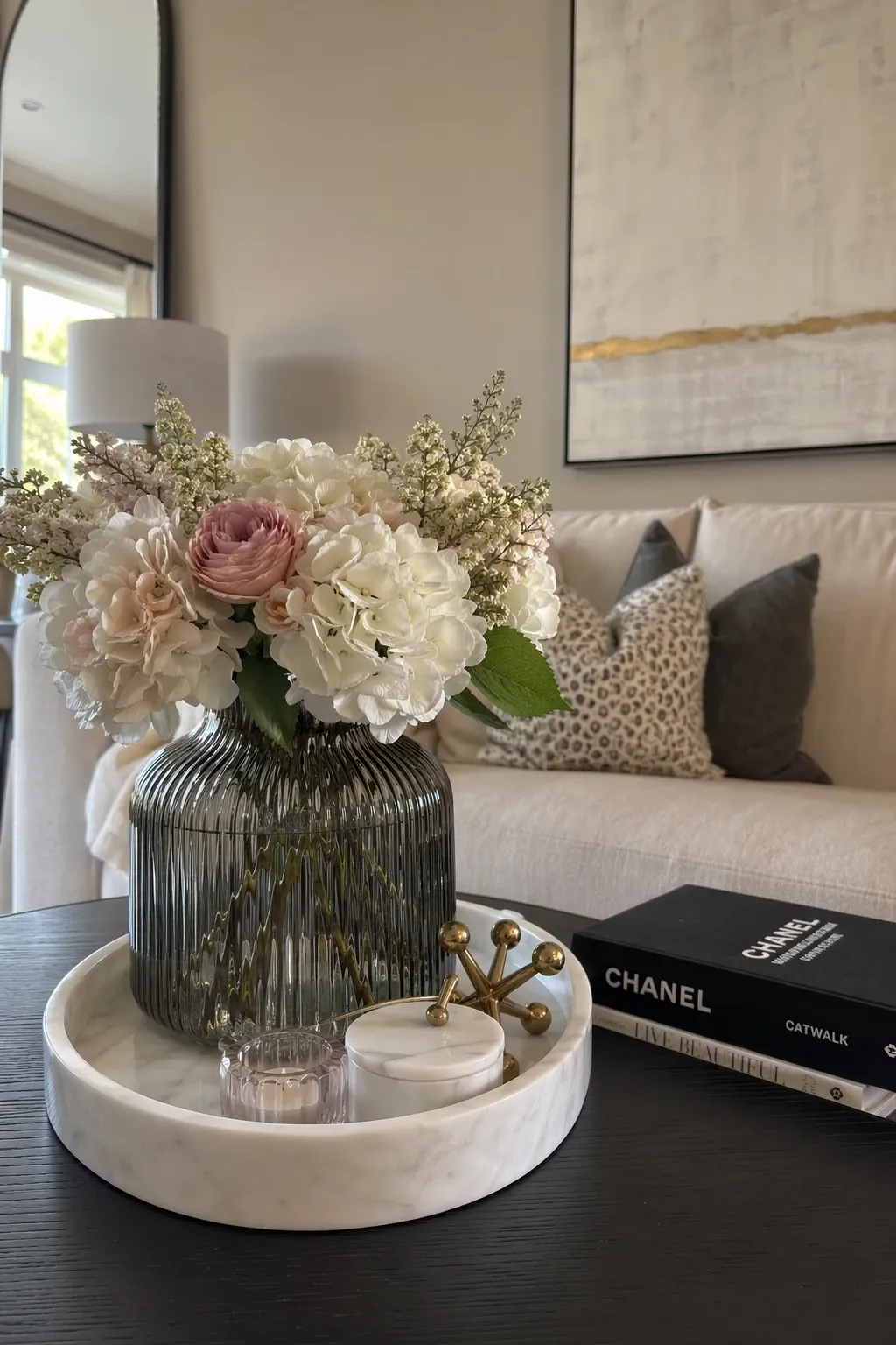 statement vase on a marble tray