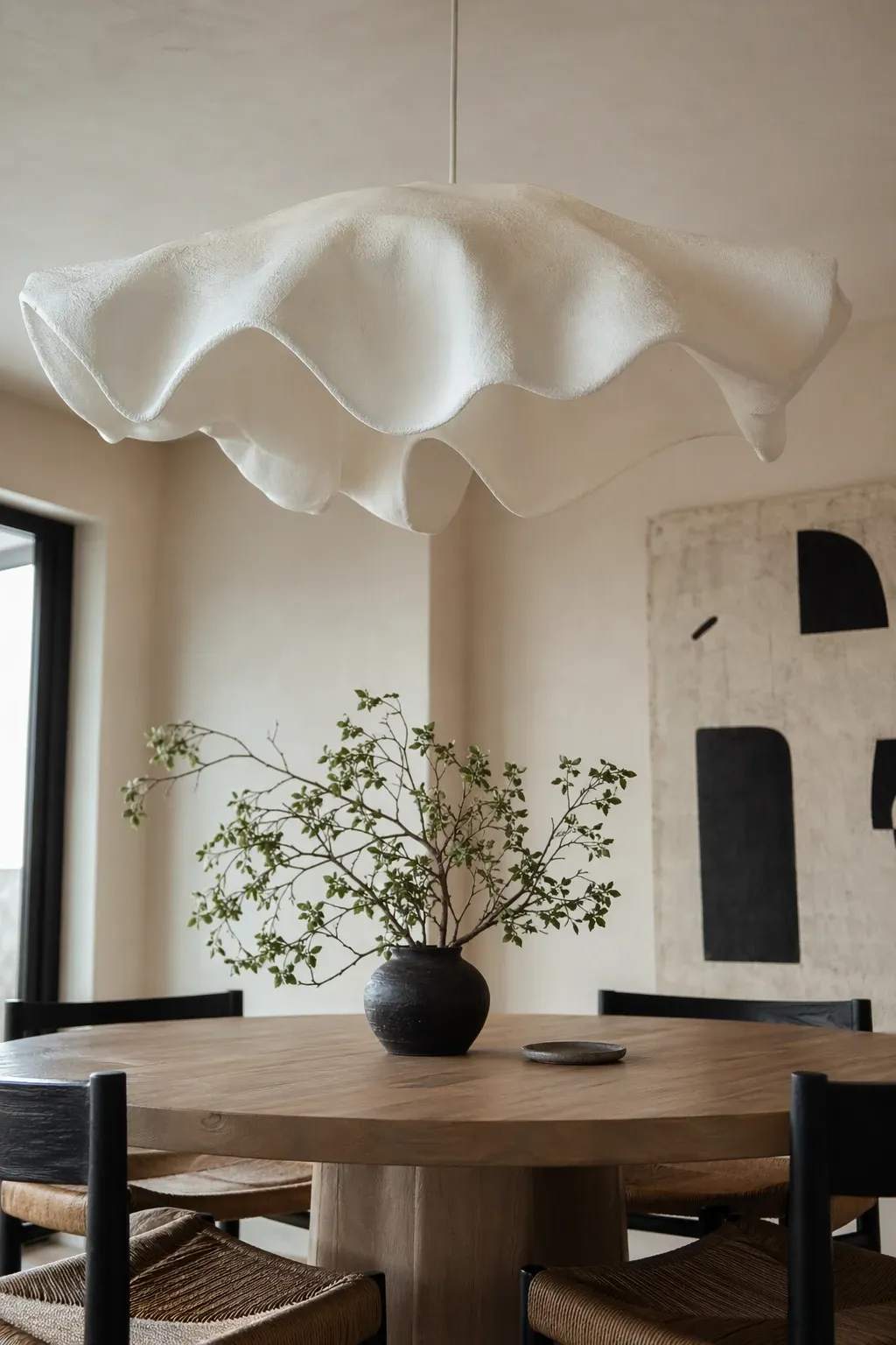 organic sculptural fixture in a dining room