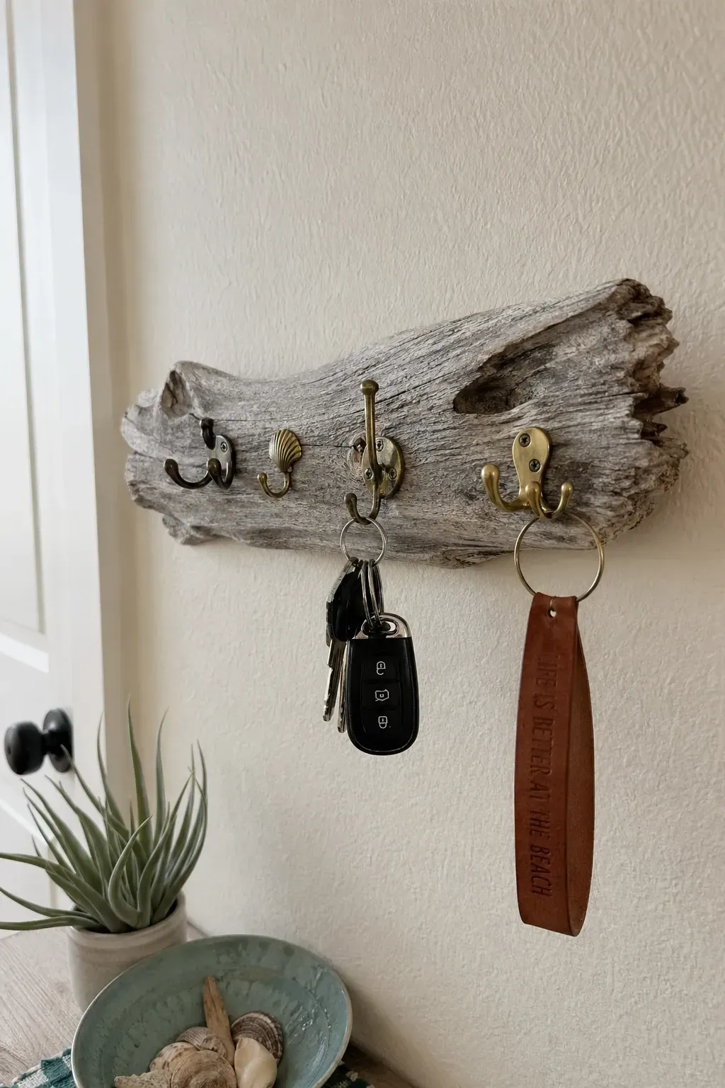 diy driftwood key holder in a entryway