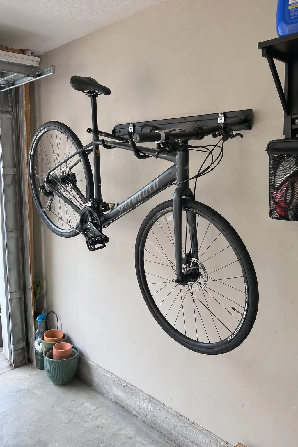 floor-to-ceiling tension poles in a garage