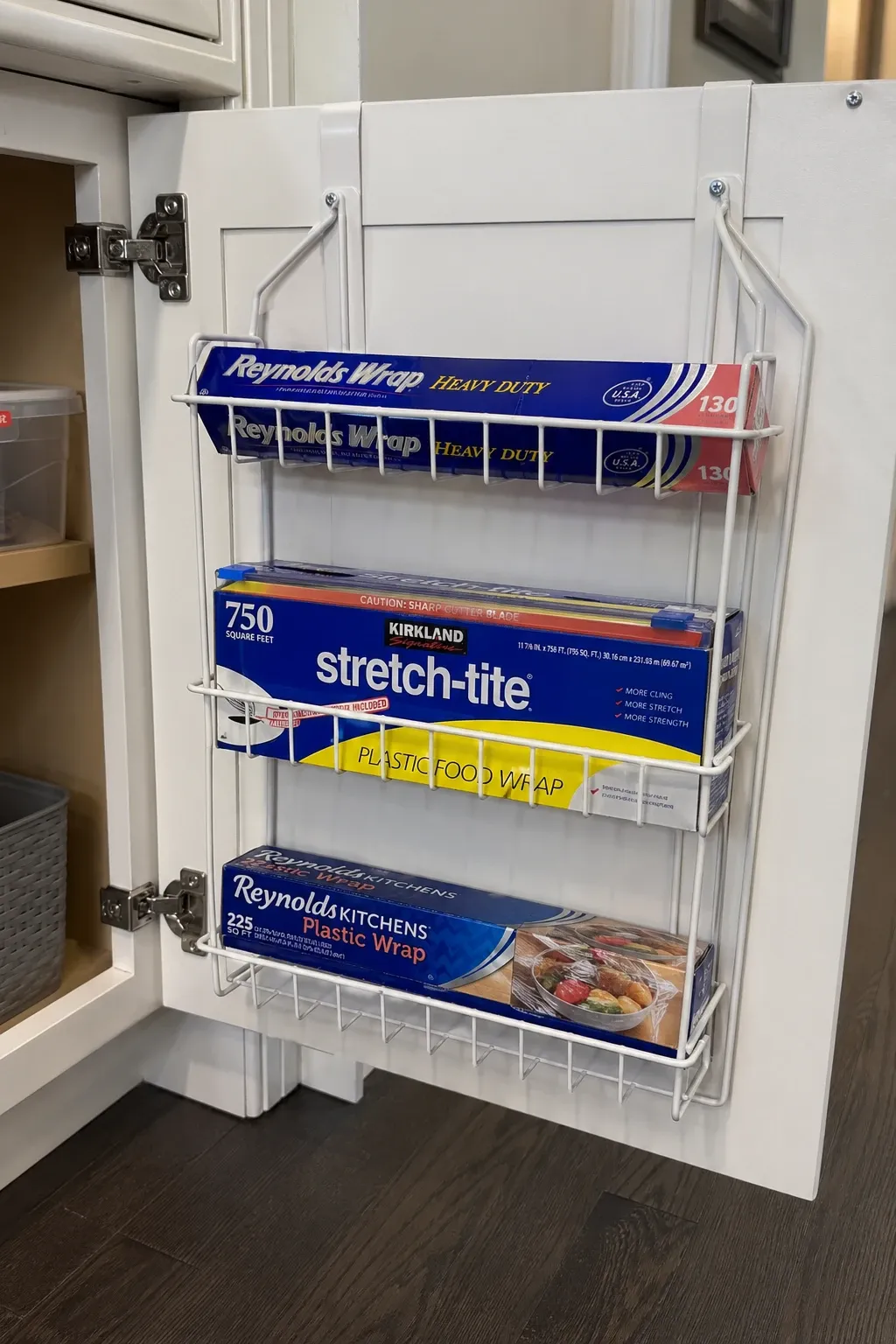 foil and bag dispensers in a kitchen