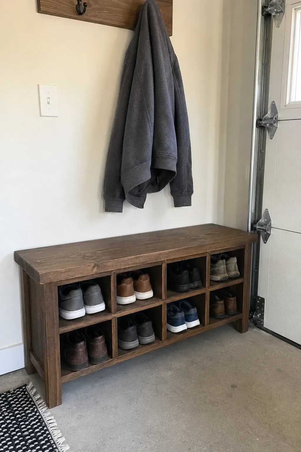 shoe storage bench with cubbies in a garage