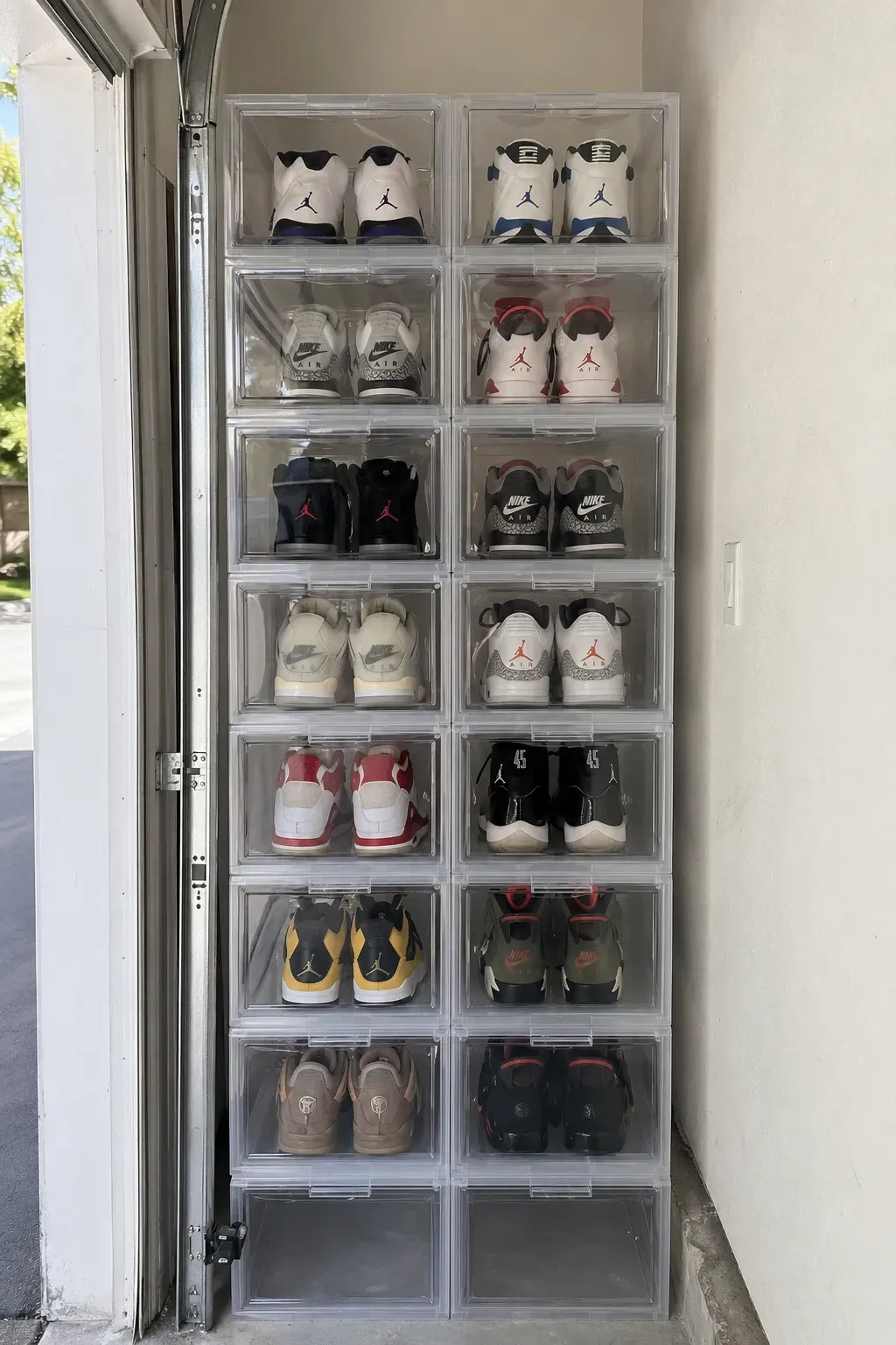 stackable clear acrylic bins in a garage