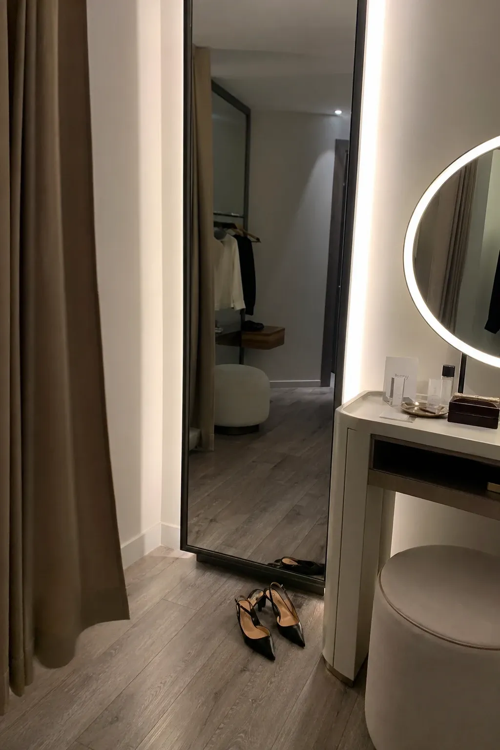 full-length mirror and styling zone in a closet