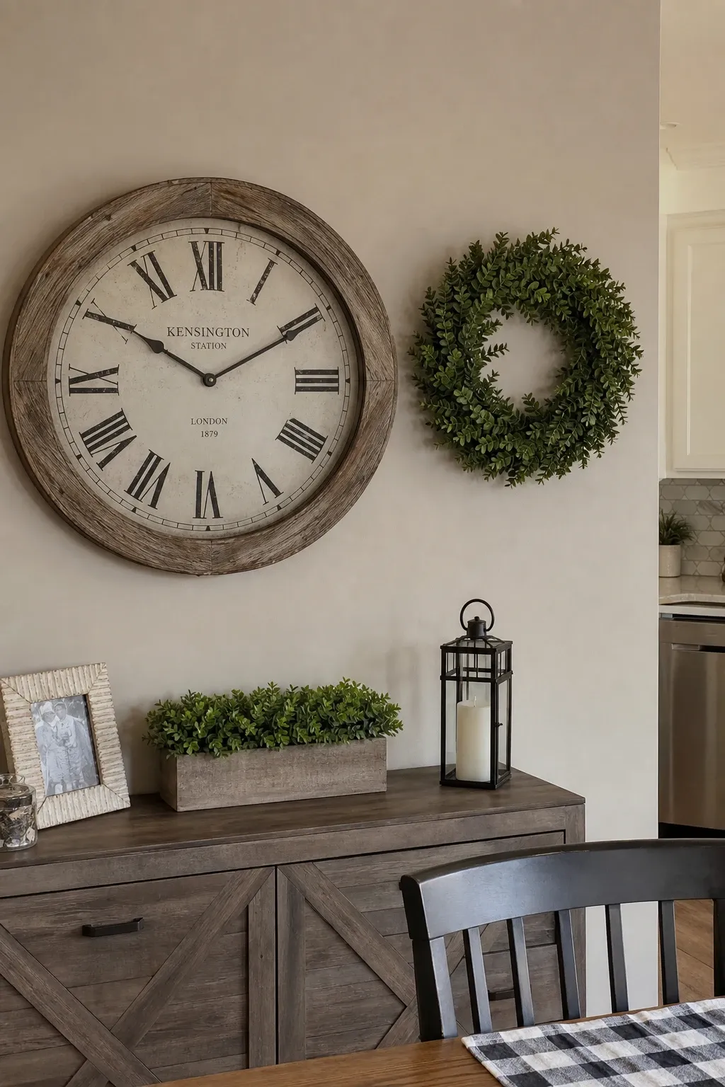 rustic wall clock and wreath in a kitchen