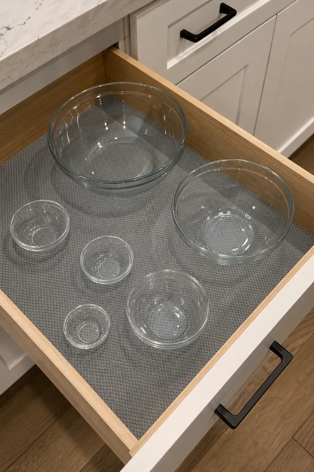 towel and linen drawer in a kitchen
