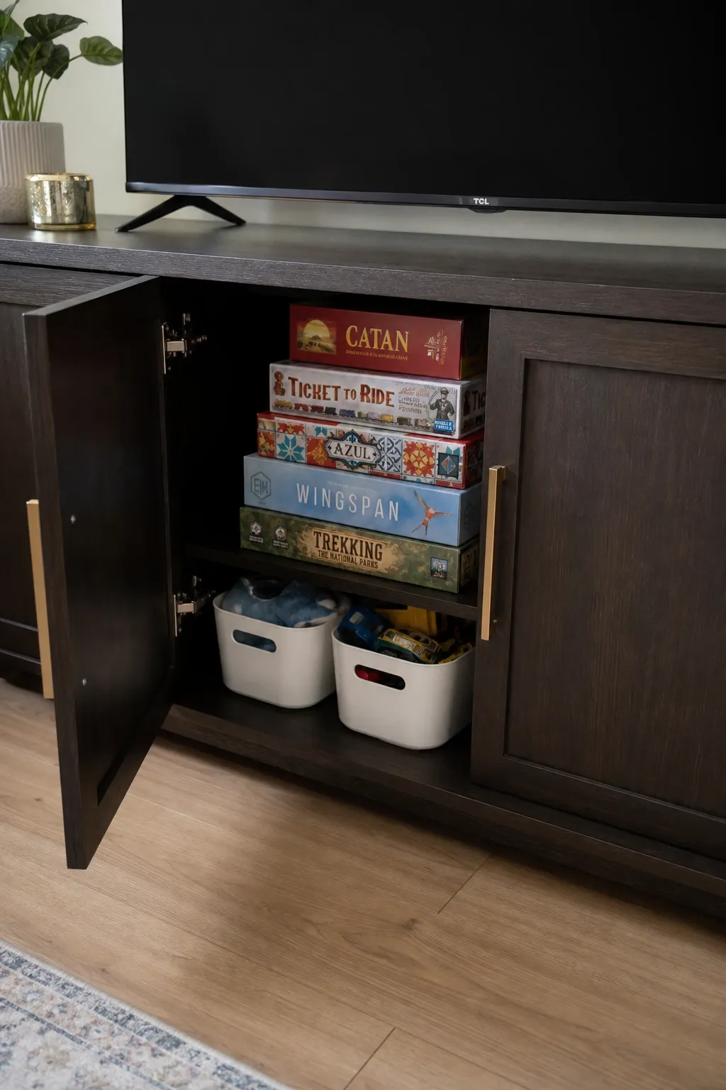 decorative bins under side tables in a living room