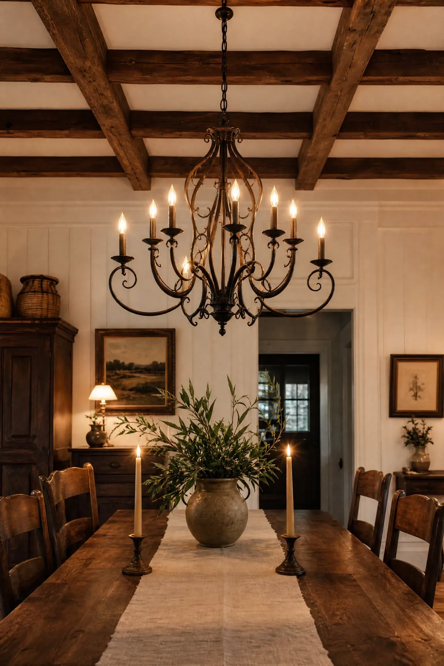 candle-style iron chandelier for traditional spaces in a dining room