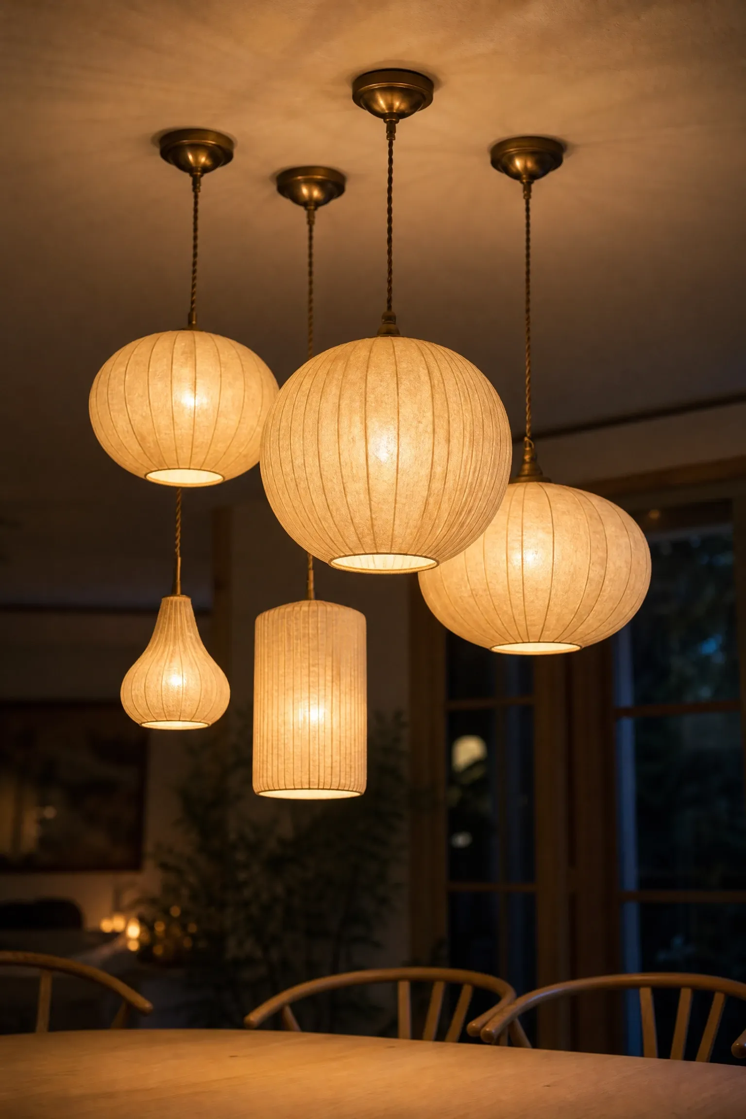 paper and washi pendant clusters in a dining room