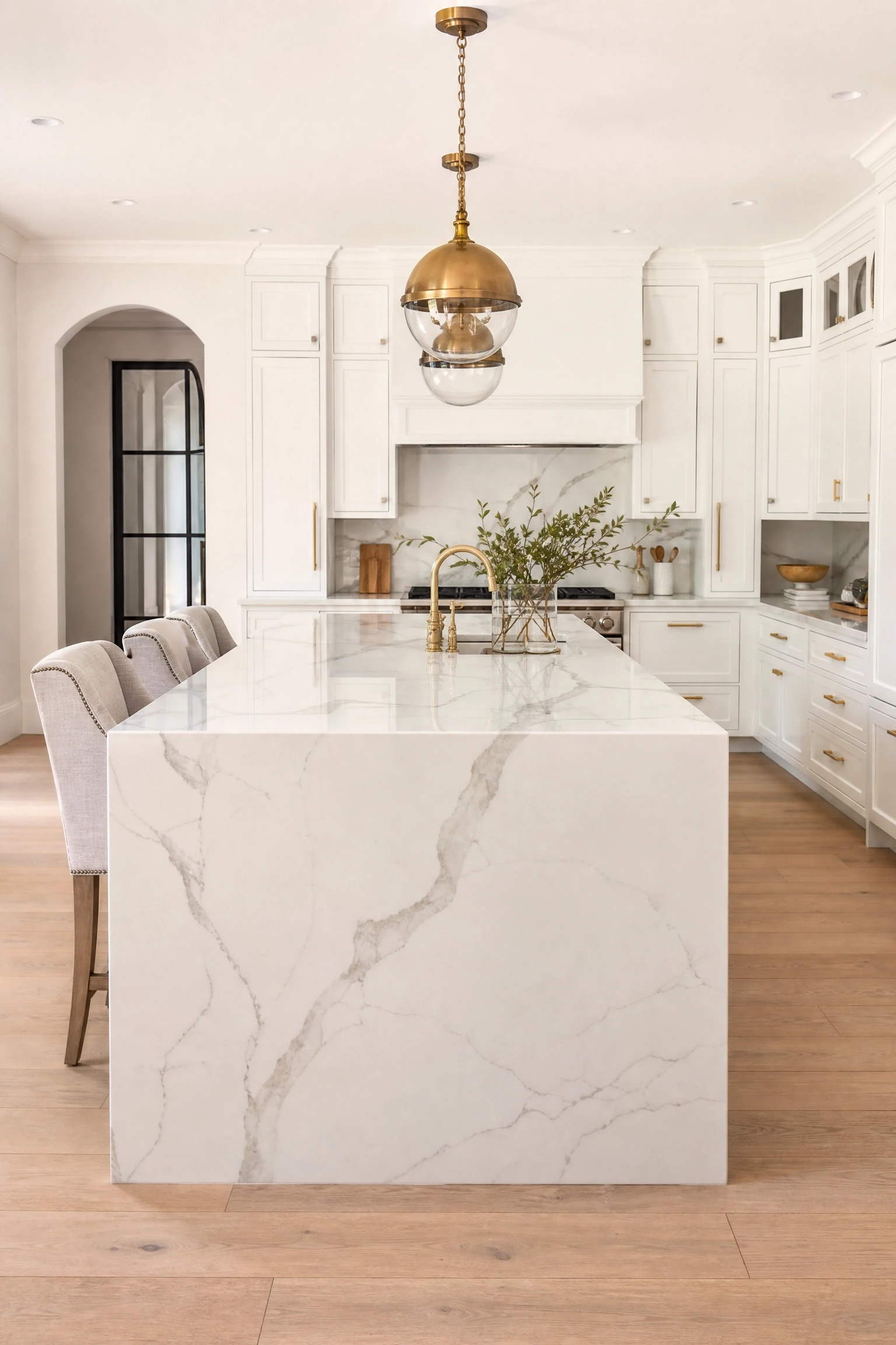 acrylic kitchen with a waterfall island