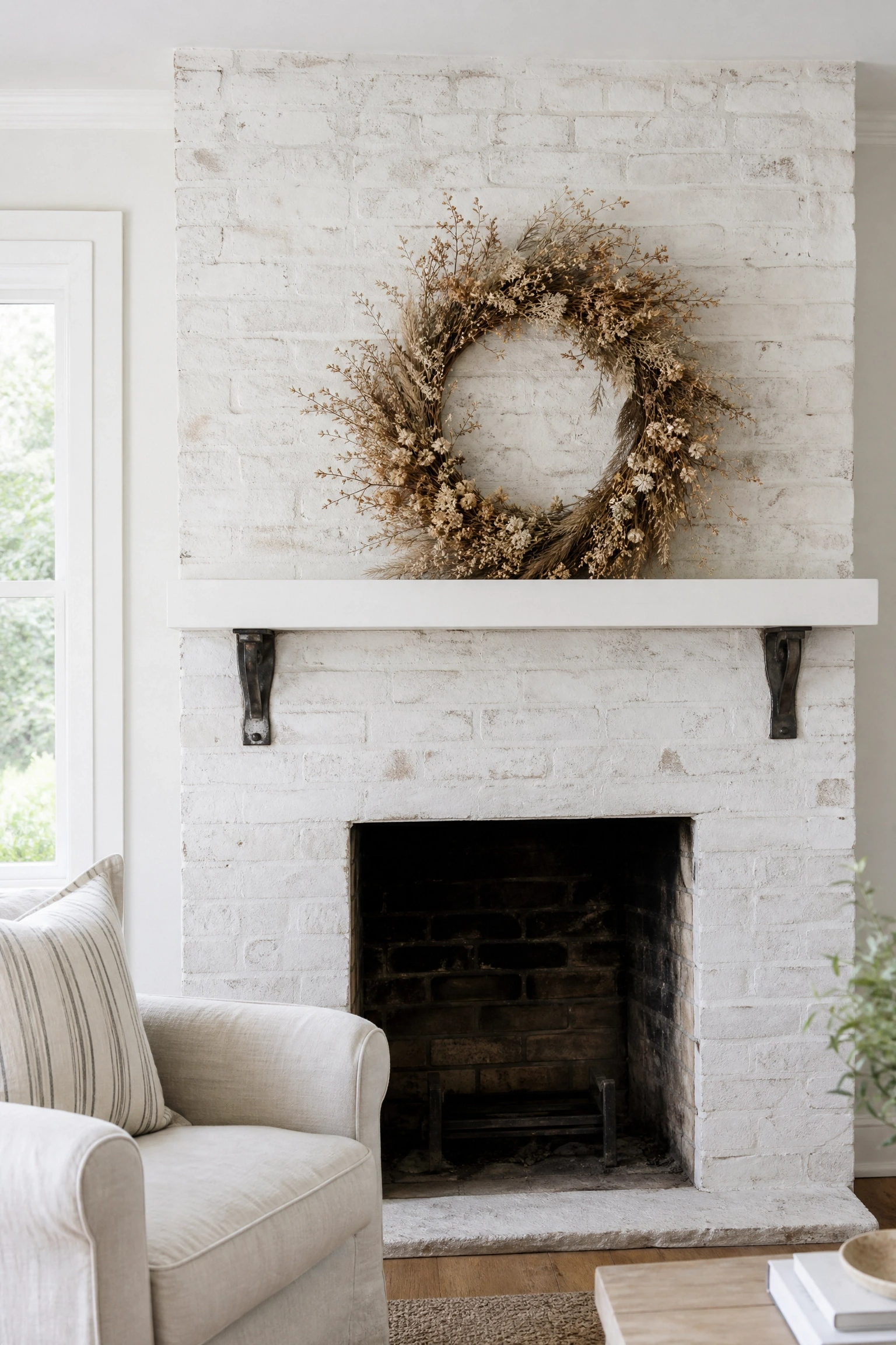 whitewashed brick with simple wood shelf
