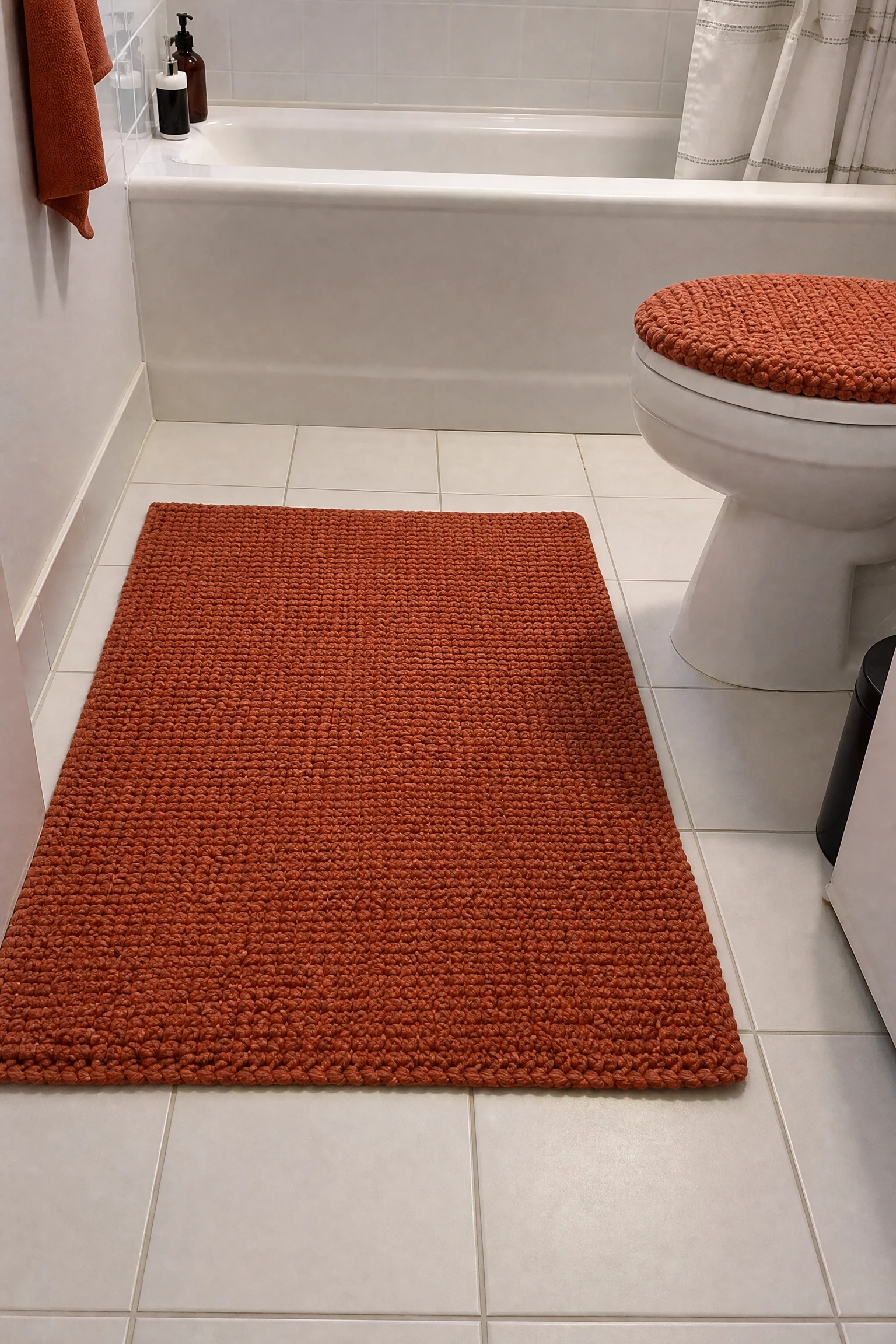 upgrade the bath mat and toilet lid cover in a bathroom