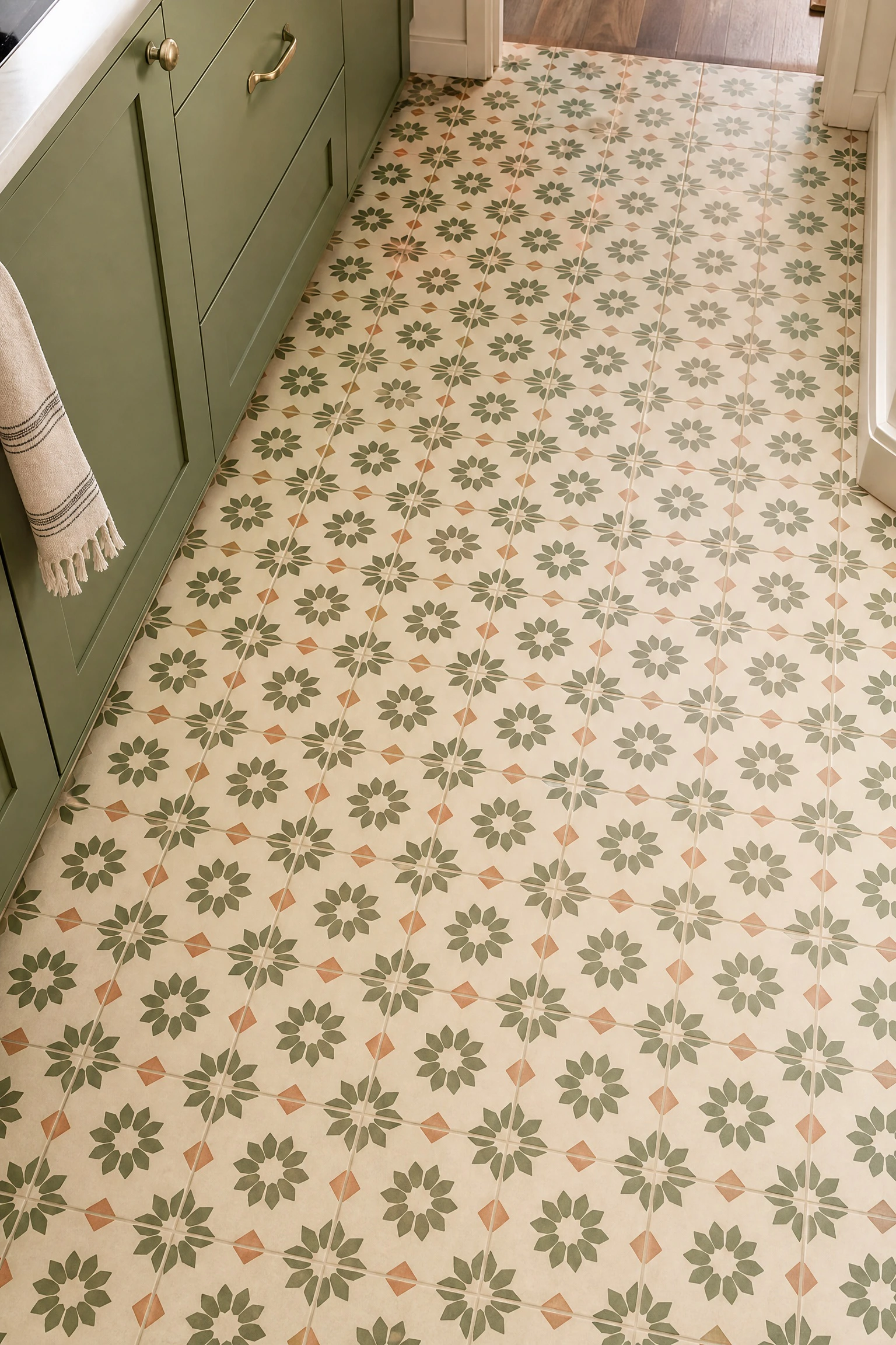 use vintage inspired tile on the floor for a retro connection in a kitchen