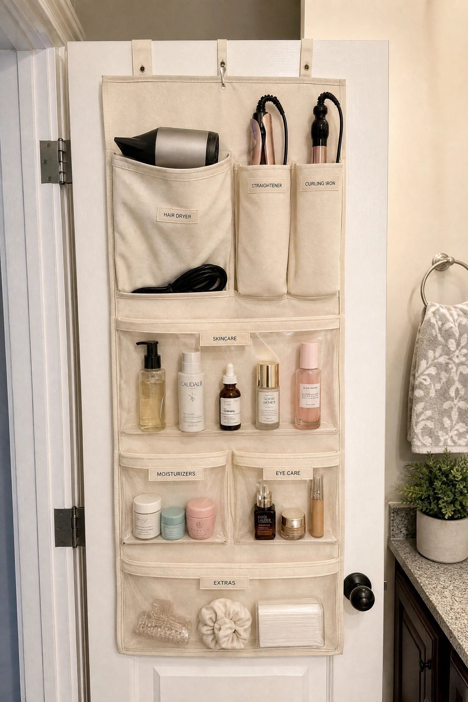 an over-door organizer with pockets in a bathroom
