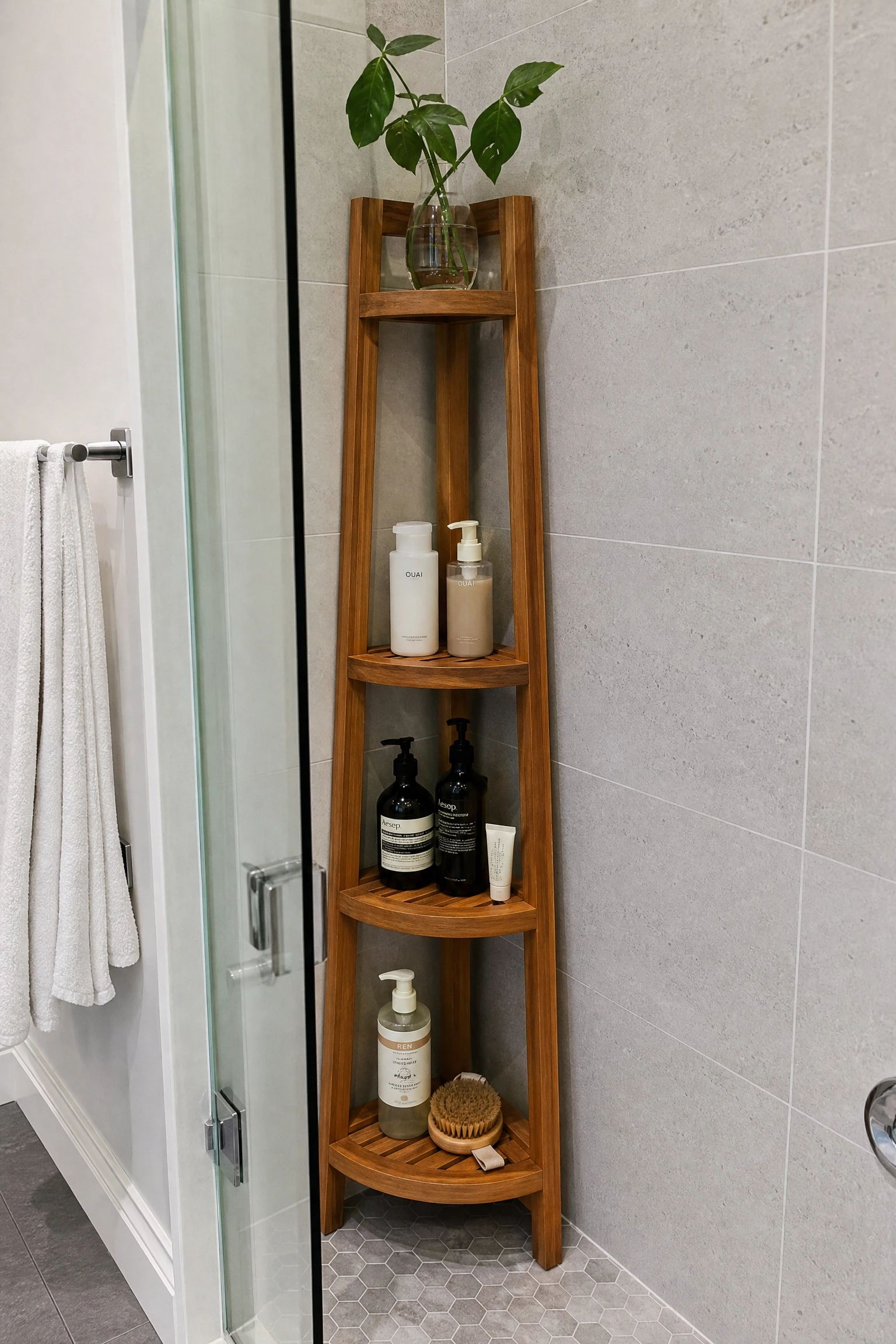 stacked timber corner shelf tower in the shower in a bathroom