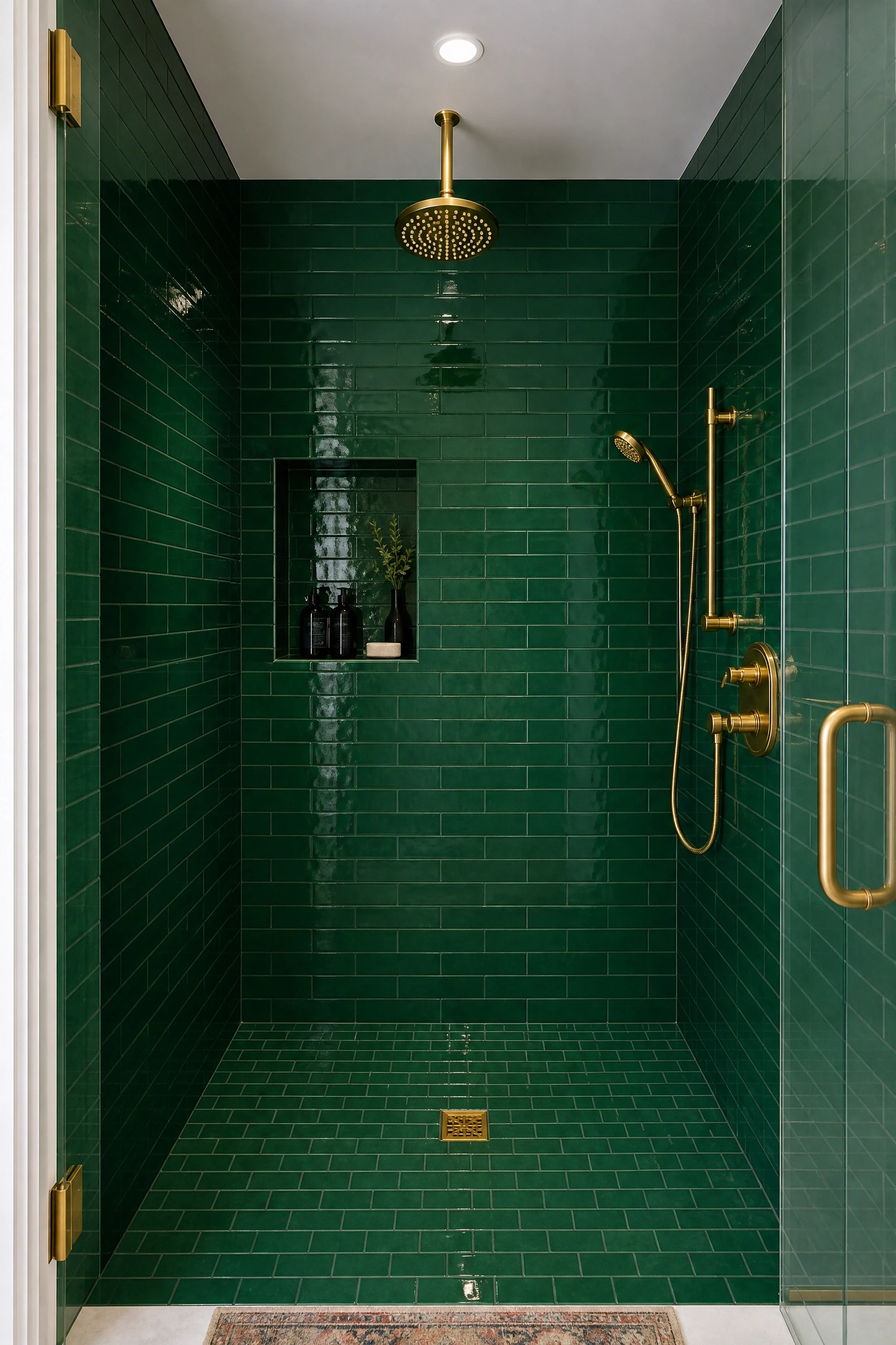 green tile that climbs the whole wall in a bathroom