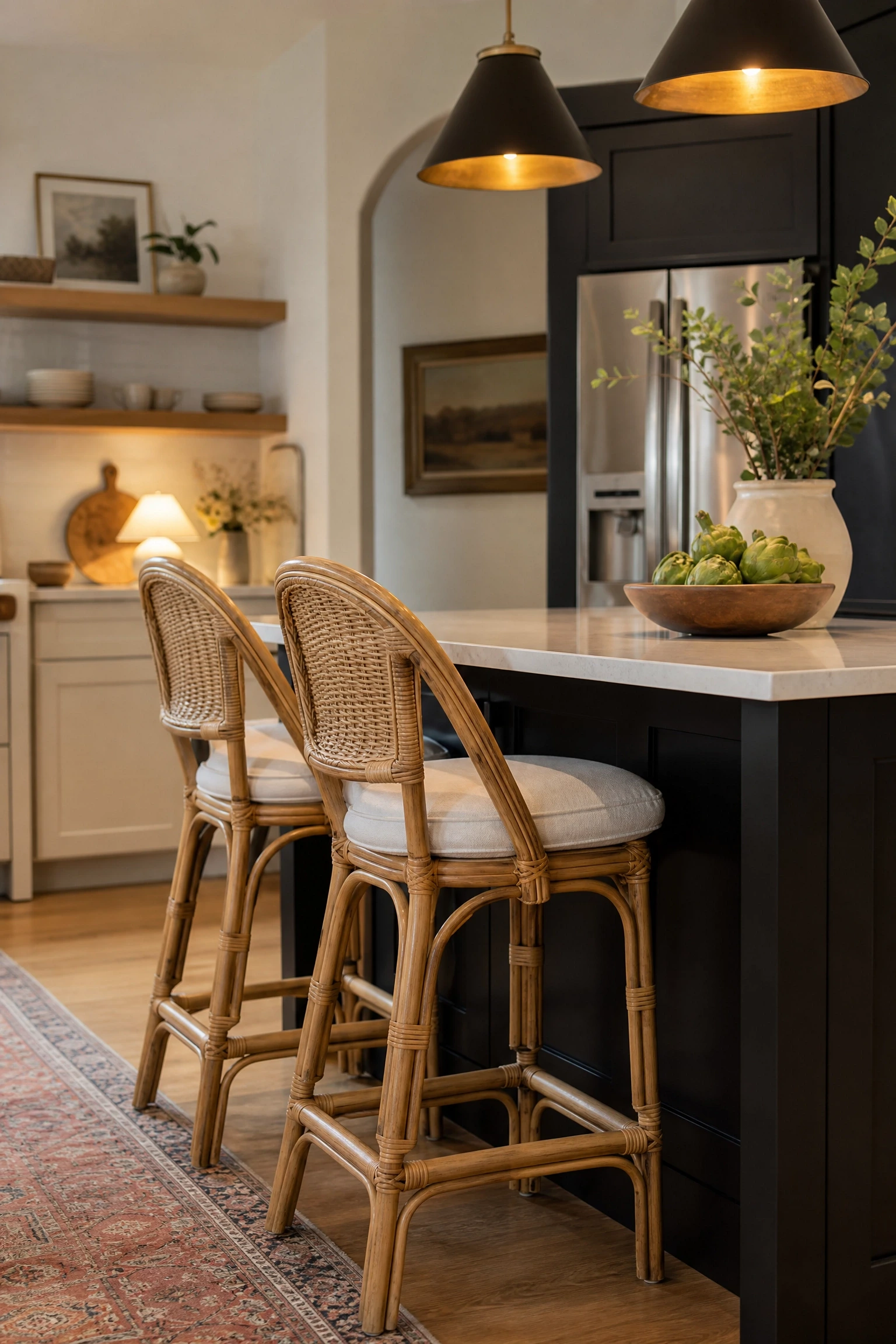 black kitchen with beige woven bar stools