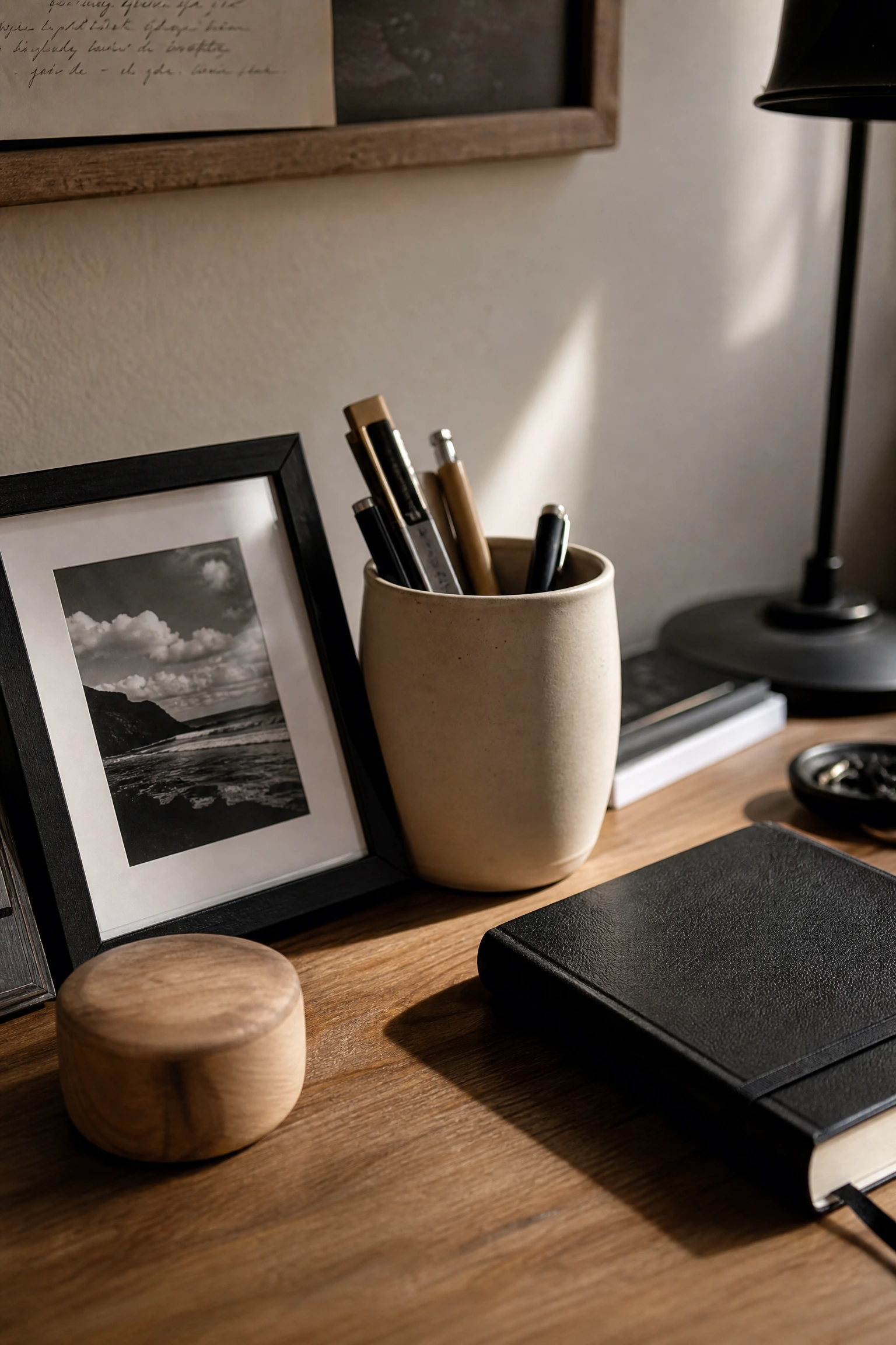 the final layer: personal objects in beige and black that tell your story in a office