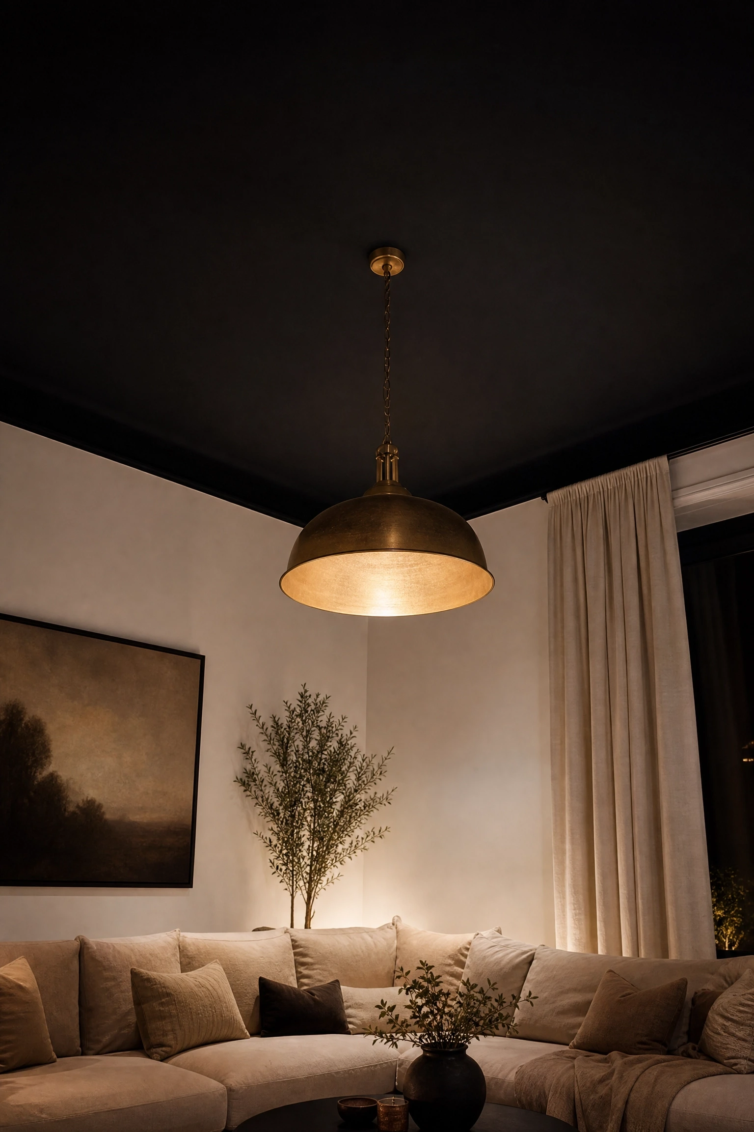 painted black ceiling with white walls and beige furnishings in a living room