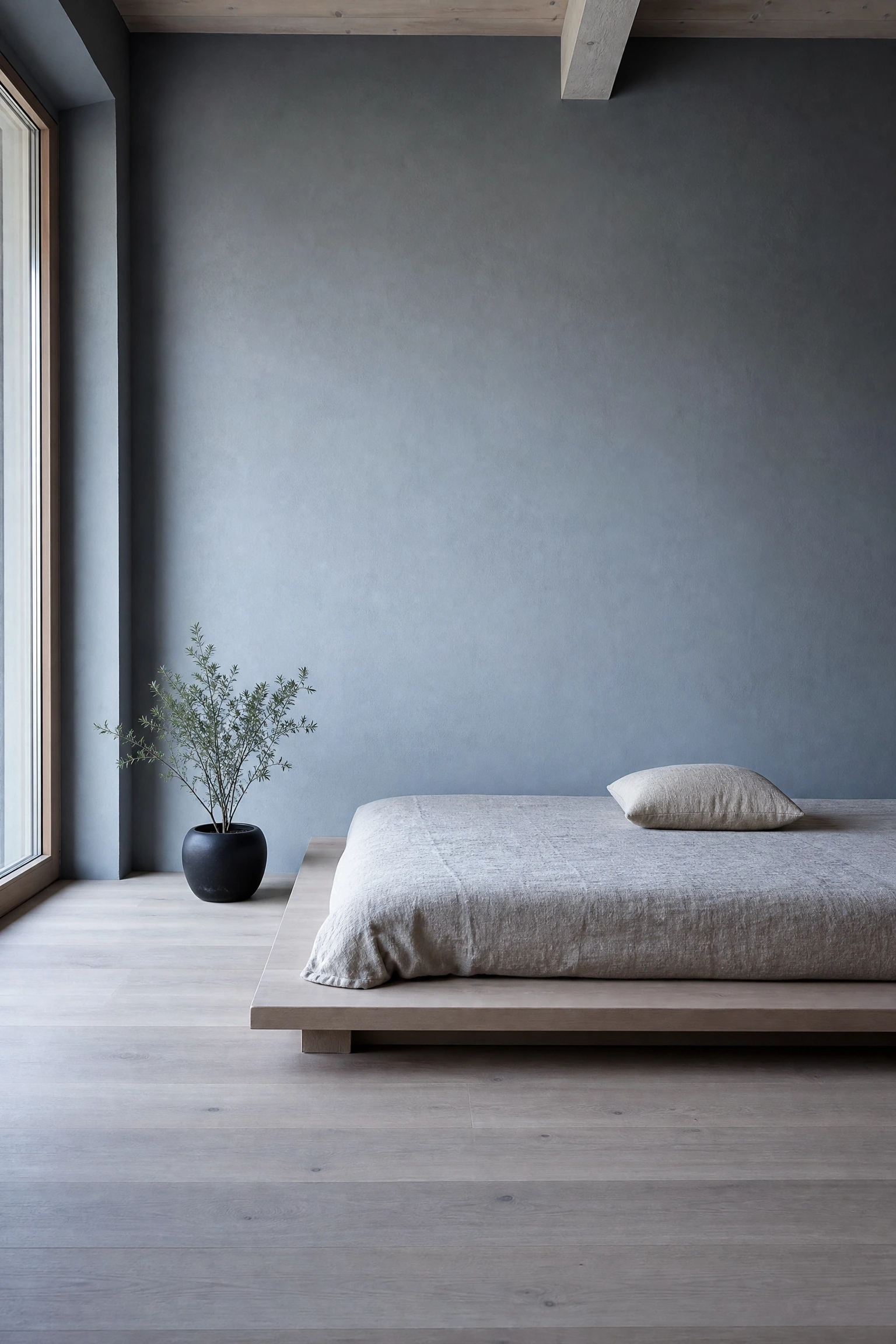 blue and wood in a japandi-influenced bedroom