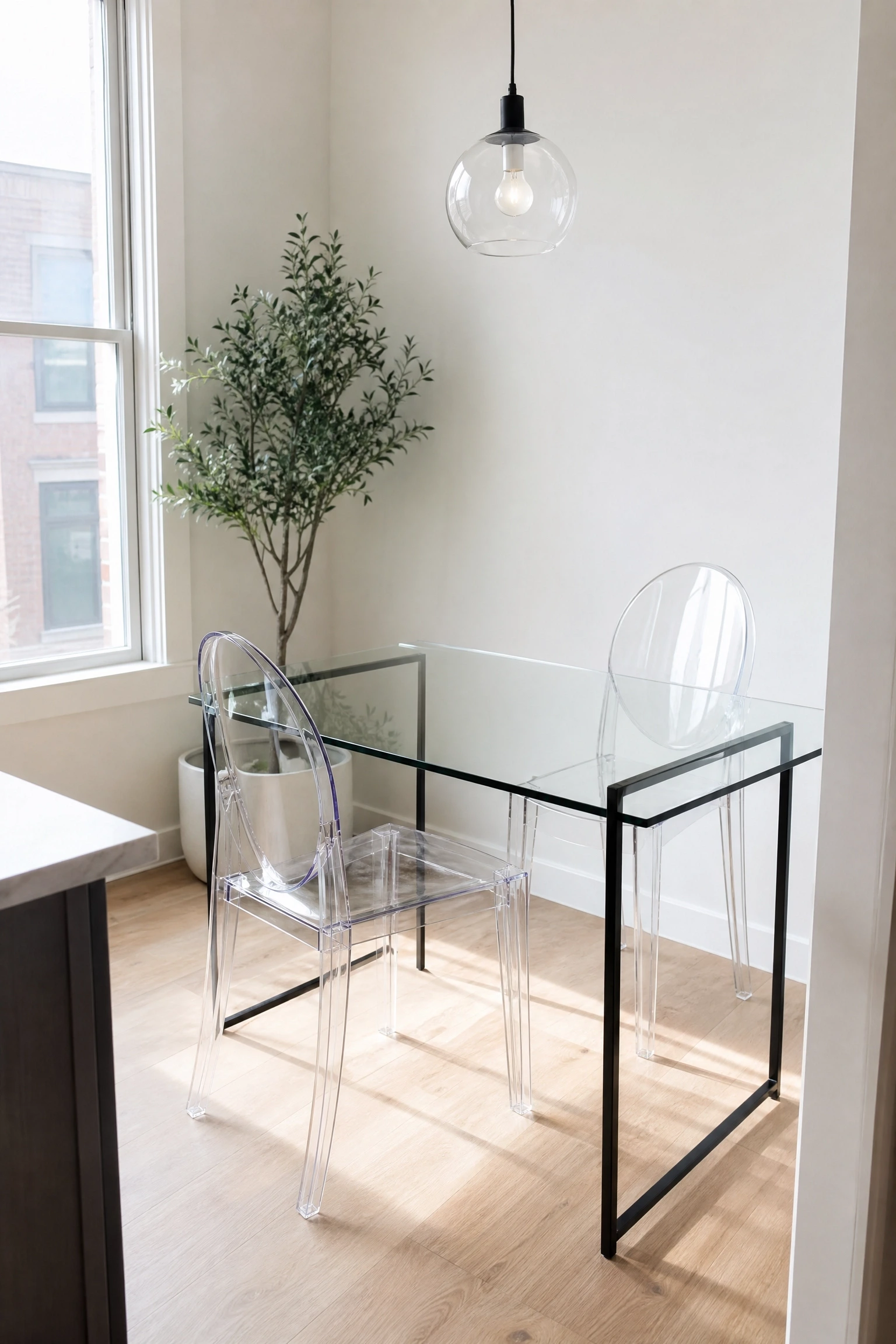 transparent furniture to keep the space feeling open in a dining room
