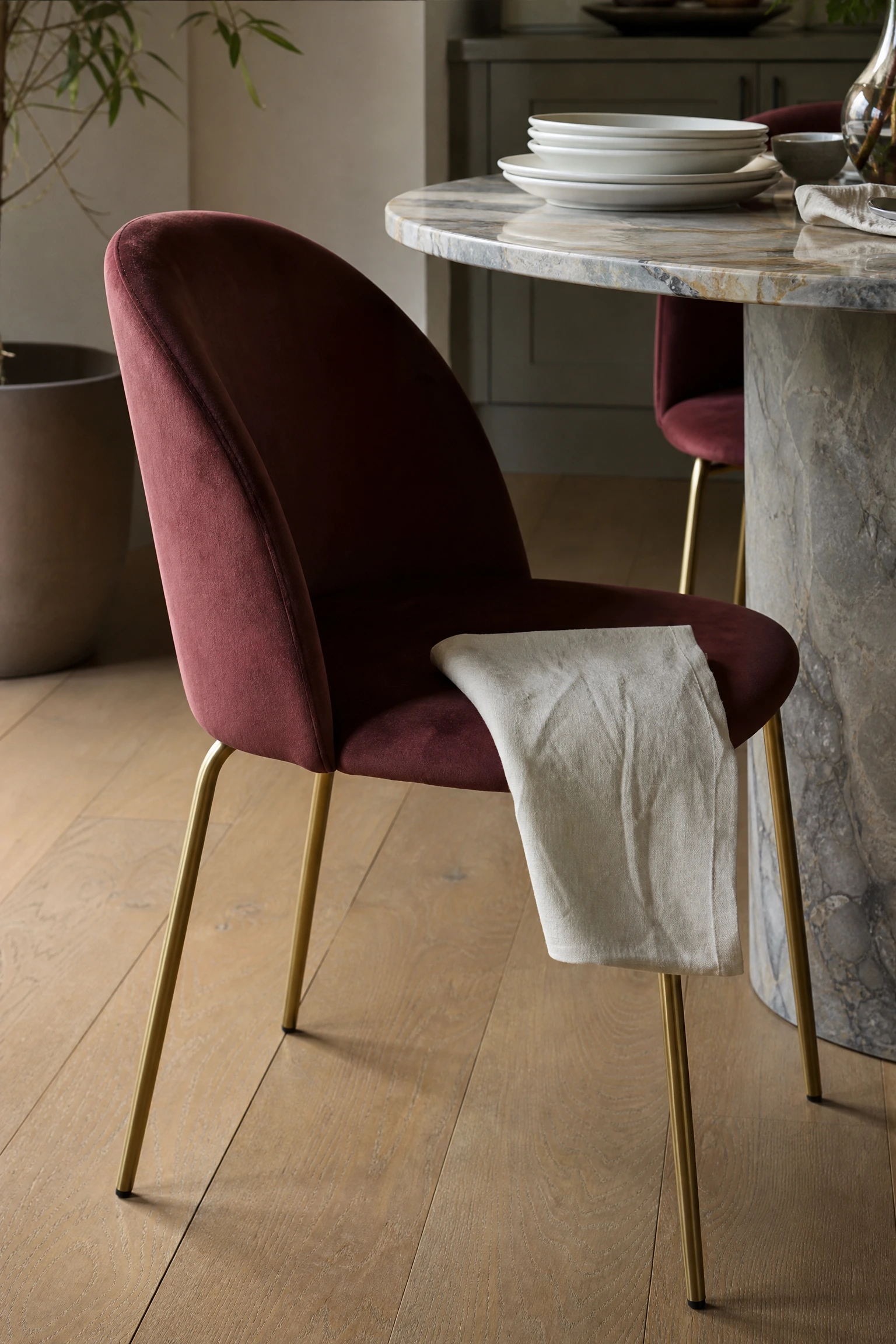 indoor-outdoor material continuity is gaining design momentum in a dining room