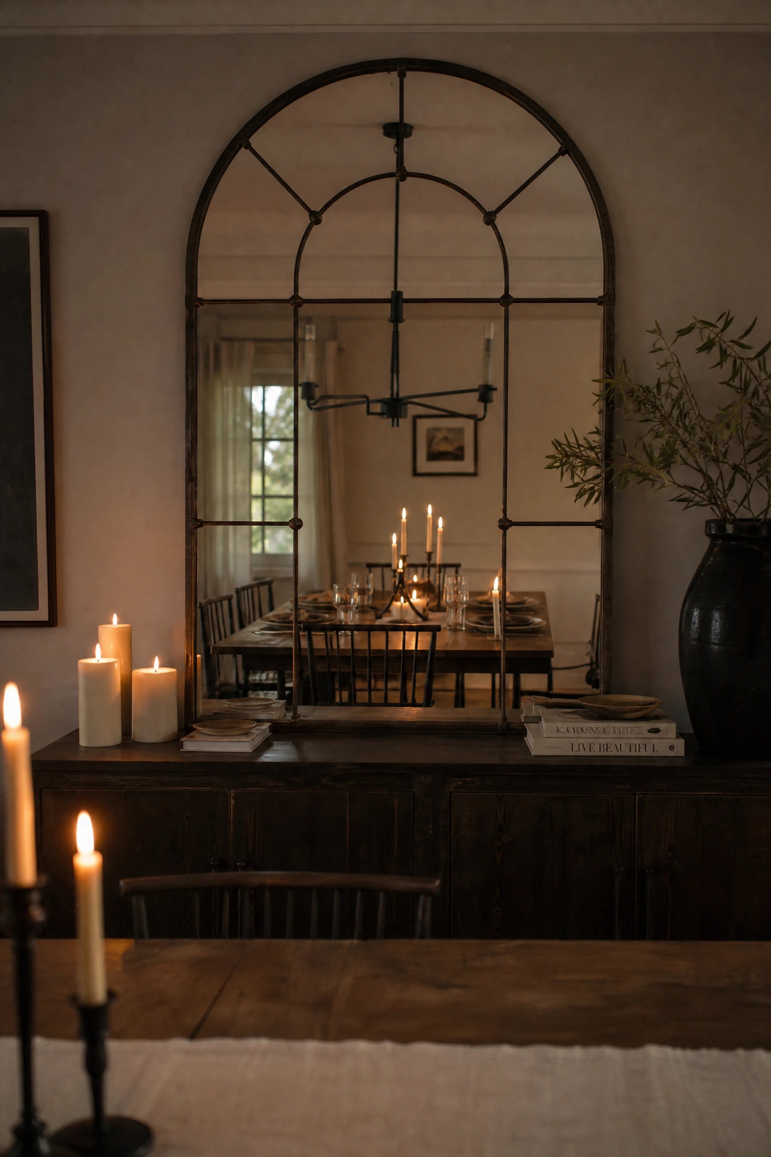 statement mirrors are earning their place at the table in a dining room