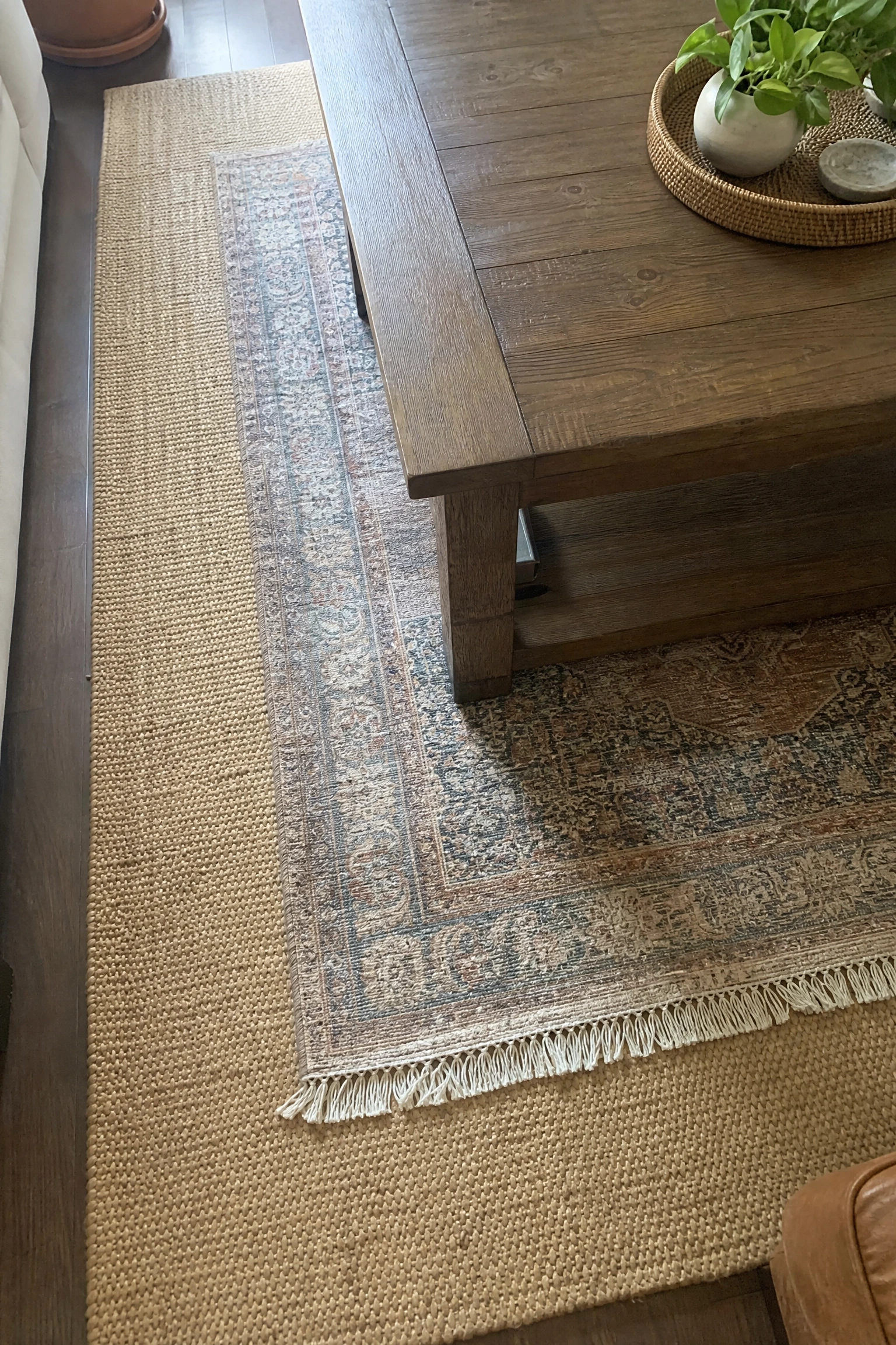 add a second rug for depth in a living room