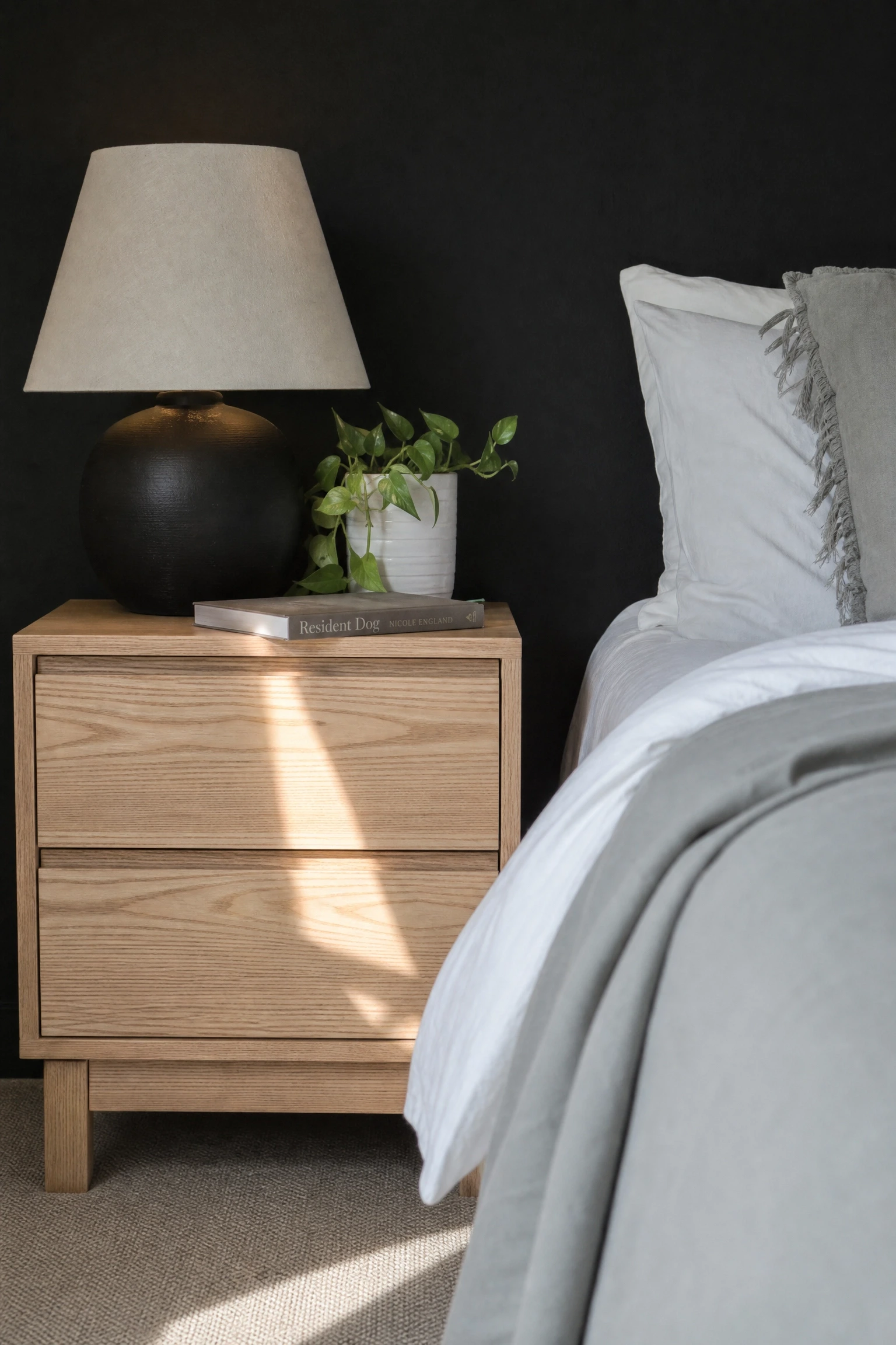 warm up the palette with natural wood tones in a bedroom